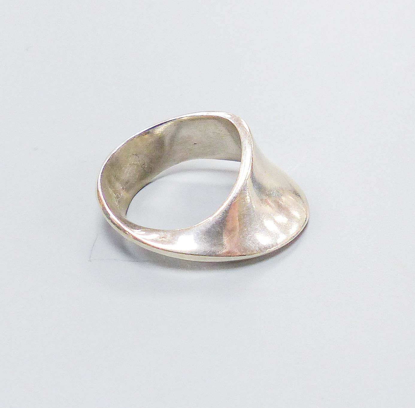 A Georg Jensen sterling ring, no. 148, size O.